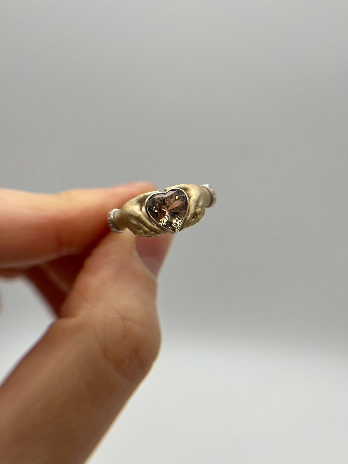 Holding Heart Ring